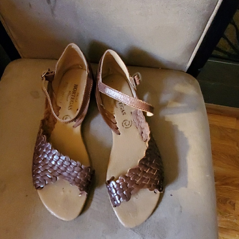 Leather sandals.